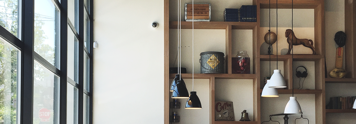 tobys estate coffee shop, williamsburg | curated shelving decor close up